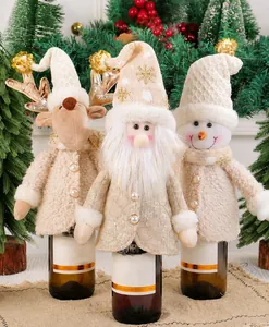 Detail of plush Santa, reindeer and snowman wine bottle covers with pearl button accents