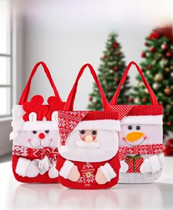 Trois sacs cadeaux de Noël festifs avec Père Noël, renne et bonhomme de neige