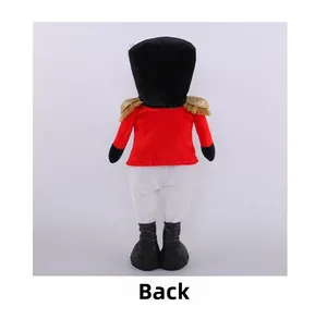 Vue arrière d'une poupée soldat de Noël en peluche avec veste rouge et épaulettes