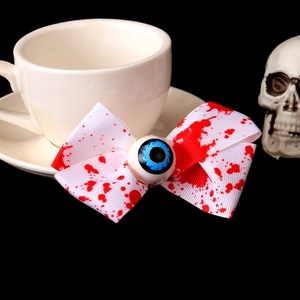 Lazo para el pelo de Halloween con un ojo realista y estampados de manchas de sangre
