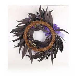 Detailed back view of Halloween wreath showing natural vine base and purple leaf arrangement