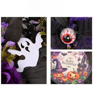 Detailed macro view of Halloween wreath featuring purple roses and creepy eyeball decorations