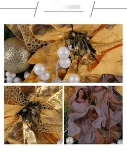 Detailed view of golden Christmas wreath with glittered poinsettia and nativity scene
