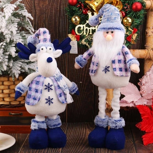Blue and purple plush Christmas reindeer and Santa figurines with snowflake embroidery