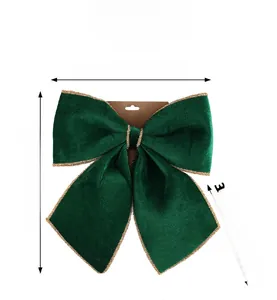 Detail of green velvet bow with gold glitter edges showing dimensions 29cm by 35cm