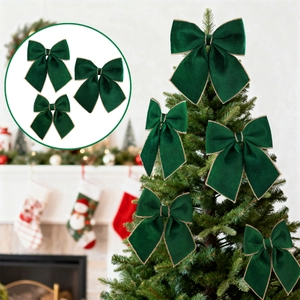 Green velvet Christmas bows with gold trim as tree toppers and decorative ornaments