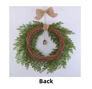 Rear view of Christmas wreath featuring natural rattan ring and rustic burlap bow