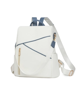 Detail view of large capacity white and blue contrast backpack with gold hardware