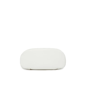 Detailed view showing the fine stitching and base of the white minimalist travel backpack