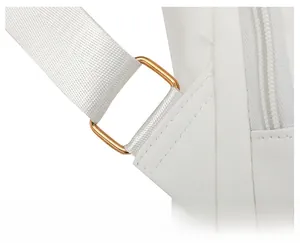 Detail of white nylon strap with golden metal adjustment buckle and reinforced stitching