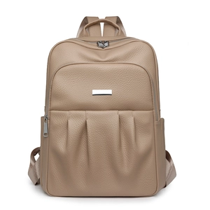 Chic khaki pebbled leather backpack for women with multi-zipper layers and silver accents