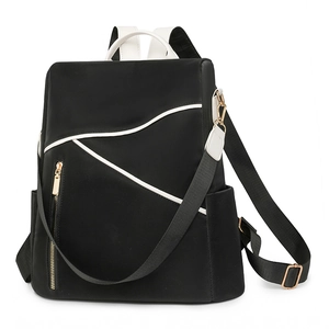 Minimalist black and white women's backpack with gold hardware and large capacity
