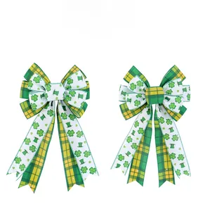 Close-up of St. Patrick's Day decorative bows with clover and green plaid ribbon patterns