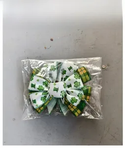 Saint Patrick's Day bow featuring shamrock and plaid patterns in festive green packaging