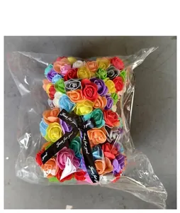Detailed macro of a colorful PE foam rose bear in packaging with Just for you ribbon