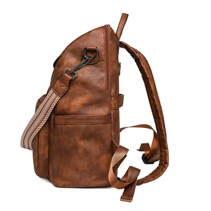 Vintage brown leather business backpack for women with ethnic style jacquard shoulder strap