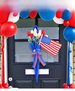 Detail of patriotic umbrella door decor with red and white tulips and USA flag
