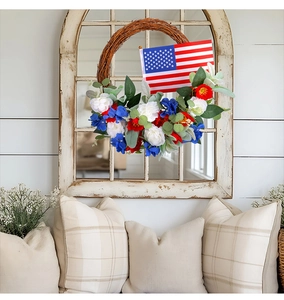 Detail of USA patriotic wreath with red white and blue flowers on rustic vine base