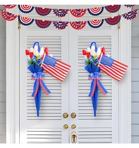 Detail of patriotic umbrella door hanging with red white tulips and USA flag