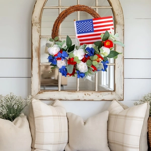 Patriotic Independence Day wreath with American flag on rustic grapevine base for home decor