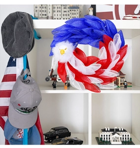 Close-up of patriotic eagle wreath featuring red, white, and blue mesh fabric design