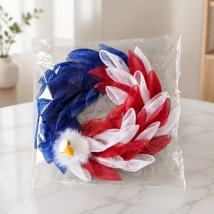 Detail view of patriotic eagle wreath in red, white, and blue mesh packaging