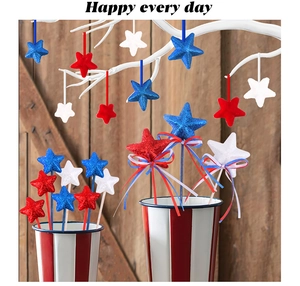 Detailed view of patriotic glitter stars with red white blue ribbons for Independence Day
