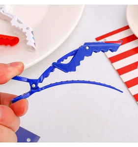 Detail of USA flag pattern alligator hair clips with double-hinged salon design