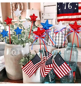 Detail of glittery stars and American flag decorations for Independence Day party decor
