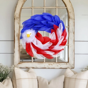 Patriotic eagle wreath decoration in red white and blue mesh for front door display
