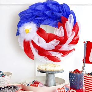 Patriotic bald eagle mesh wreath in red white and blue for 4th of July door decoration