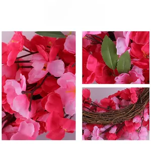 Detailed macro view of pink silk petals and hand-woven rattan wreath base for spring decor