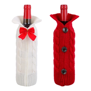 Knitted Christmas wine bottle covers with red bow and buttons for festive table decor