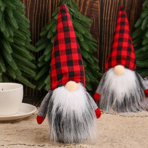Christmas gnome plush set with red and black checkered hats on a rustic festive background
