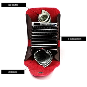 Detail view of red lychee grain leather card holder with 10 slots and cash compartments