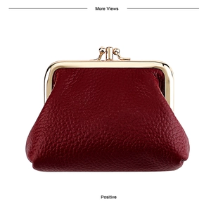 Close-up of dark red lychee grain leather wallet with retro golden clasp closure