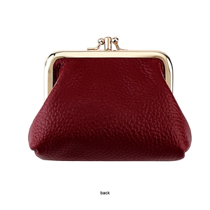 Rear view of deep red pebbled leather coin purse with classic golden kiss-lock closure