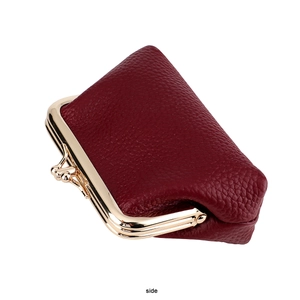 Side view of wine red genuine leather coin purse with classic golden kiss-lock closure
