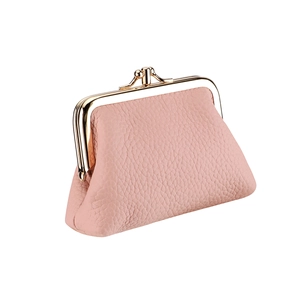 Detailed view of pink lychee grain leather wallet with golden metal clasp closure