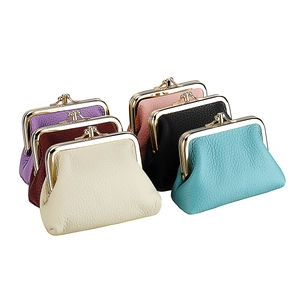 Set of six retro kiss-lock coin purses in textured leather with vintage metal frames