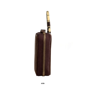 Side view of vintage brown crazy horse leather car key pouch with gold metal hook