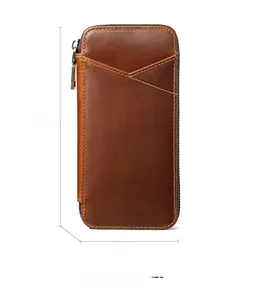 Detail view of vintage brown leather pen case showing 18cm x 9cm x 3cm dimensions
