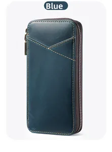 Detailed view of blue crazy horse leather pen case with yellow stitching and metal zipper