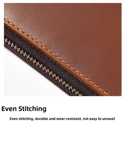 Close-up of uniform stitching and metal zipper on vintage crazy horse leather pencil case