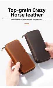 Detail of crazy horse leather pen case with zipper showing texture and stitching