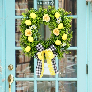 Square lemon wreath with green leaves, yellow roses, and a black-and-white buffalo plaid bow