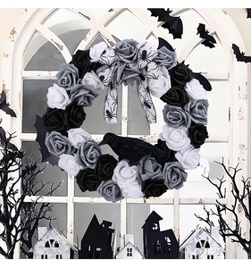 Halloween wreath with black roses and a crow decoration against a vintage window background