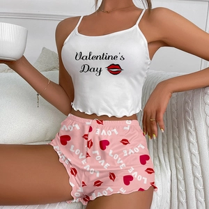 Detail of Valentine's Day pajama set with ruffled edges and heart print on shorts