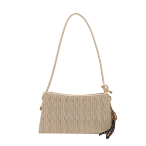 Chic beige straw woven underarm bag for women with tennis racket charm and shoulder strap