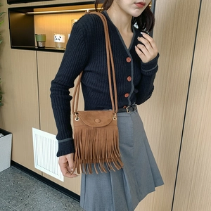 Bohemian brown suede fringe bucket bag with long tassels and crossbody shoulder strap